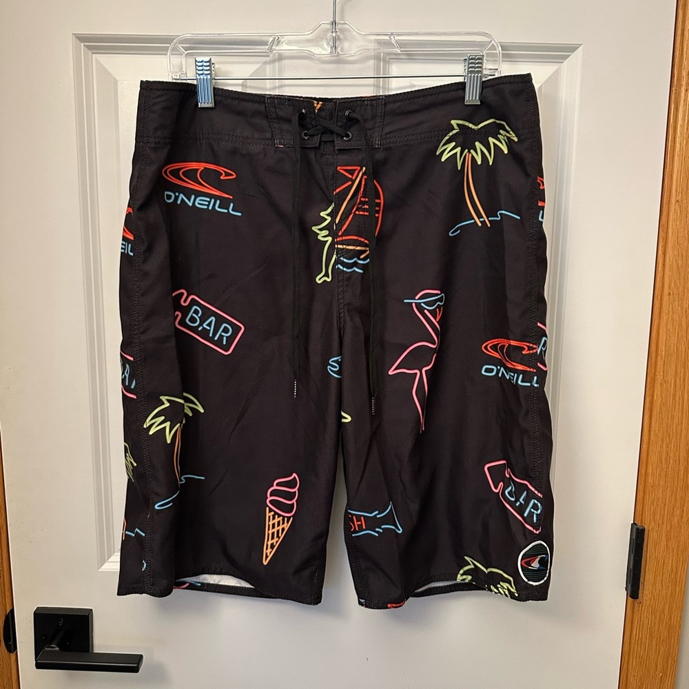 O'Neill Black Board Shorts with Neon Patterns - size 33